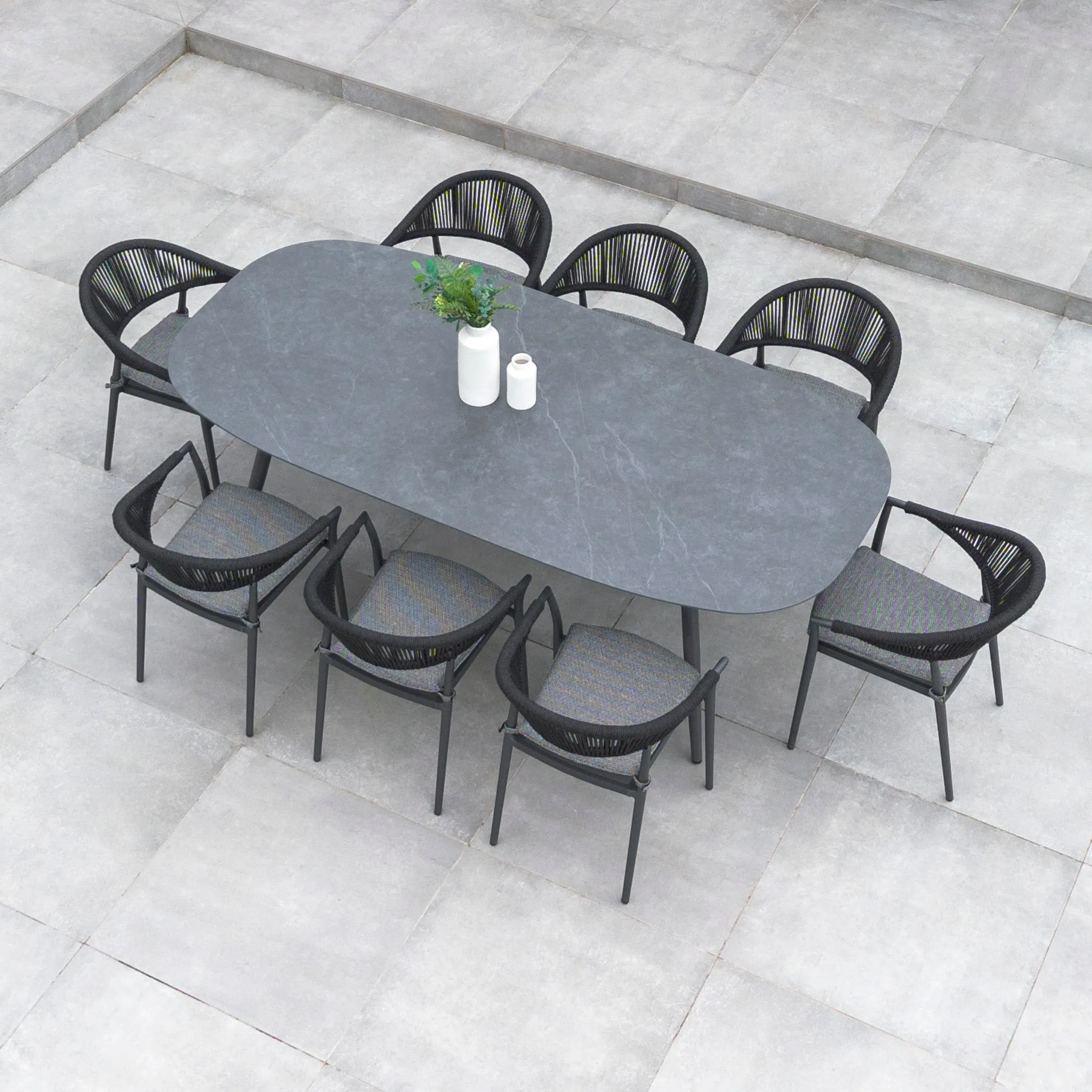 Cloverly 8 Seat Rope Oval Dining Set with Ceramic Table in Charcoal