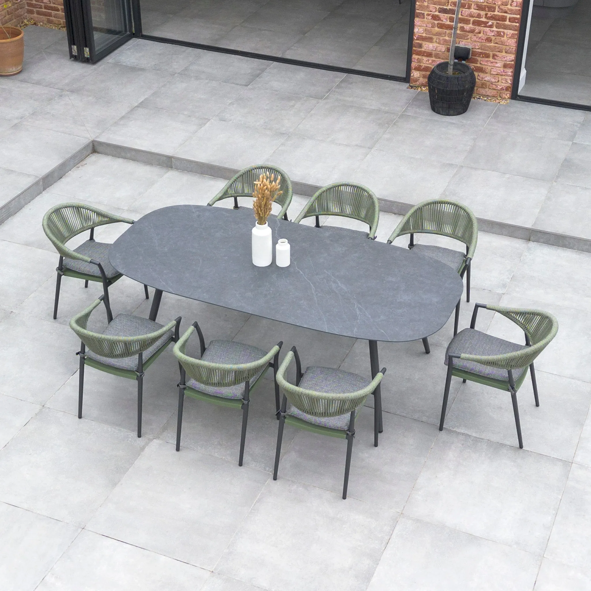 Cloverly 8 Seat Rope Oval Dining Set with Ceramic Table in Olive Green